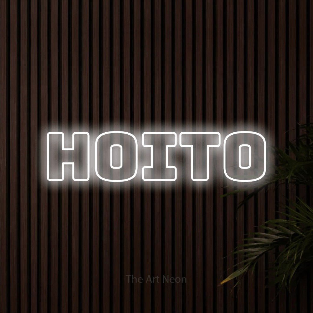 LED neon sign reading “Hoito”, arranged in a single line.