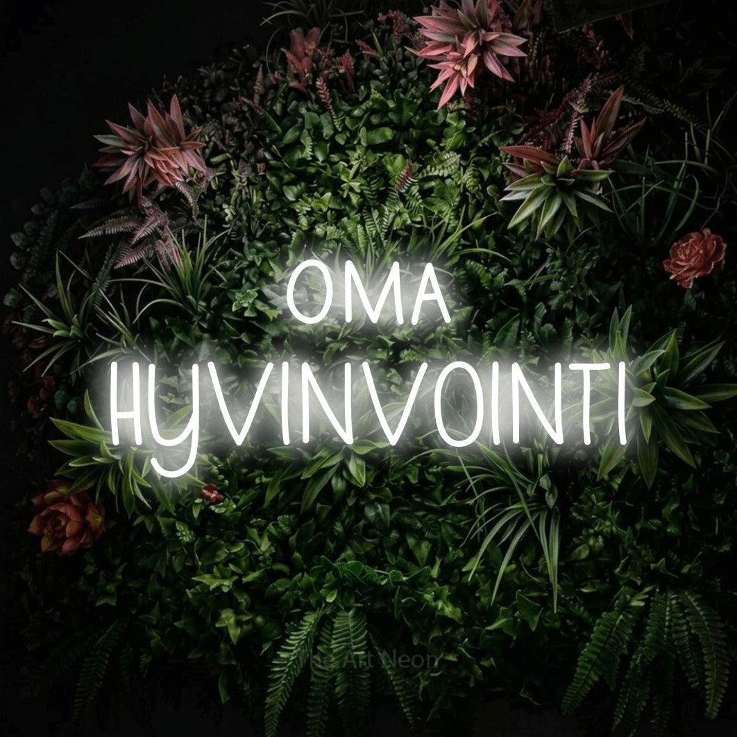 LED neon sign reading “oma HYVINVOINTI”, arranged in 2 lines.