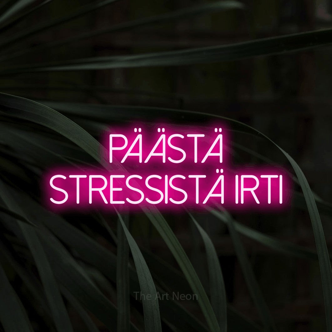 LED neon sign reading “Päästä stressistä irti”, arranged in 2 lines.