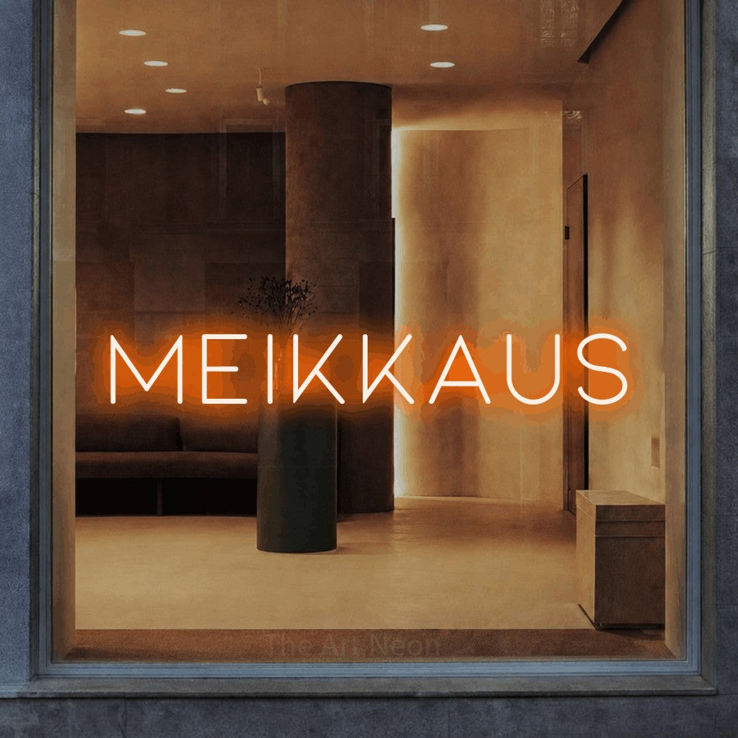 LED neon sign reading “MEIKKAUS”, arranged in a single line.
