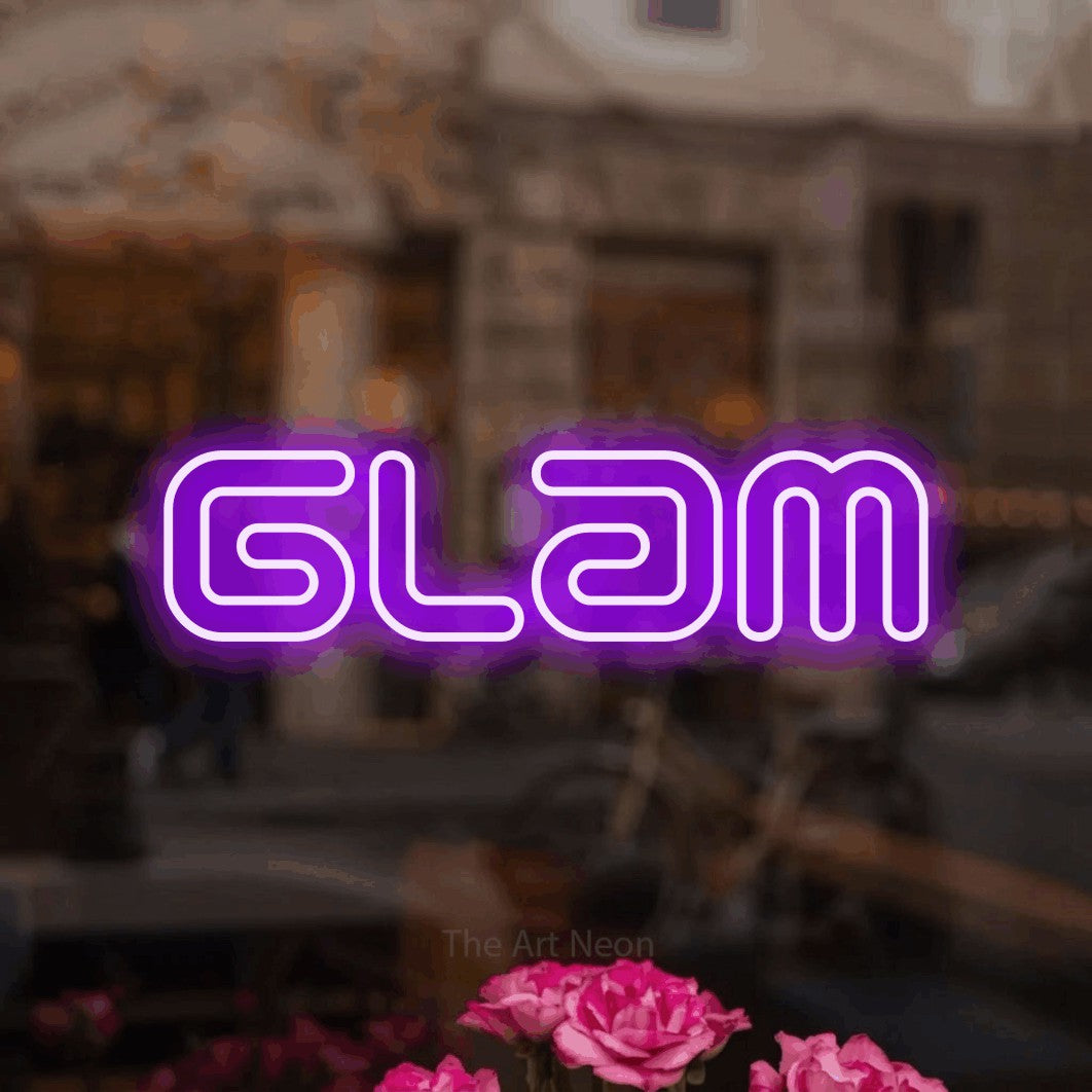 LED neon sign reading “Glam”, arranged in a single line.