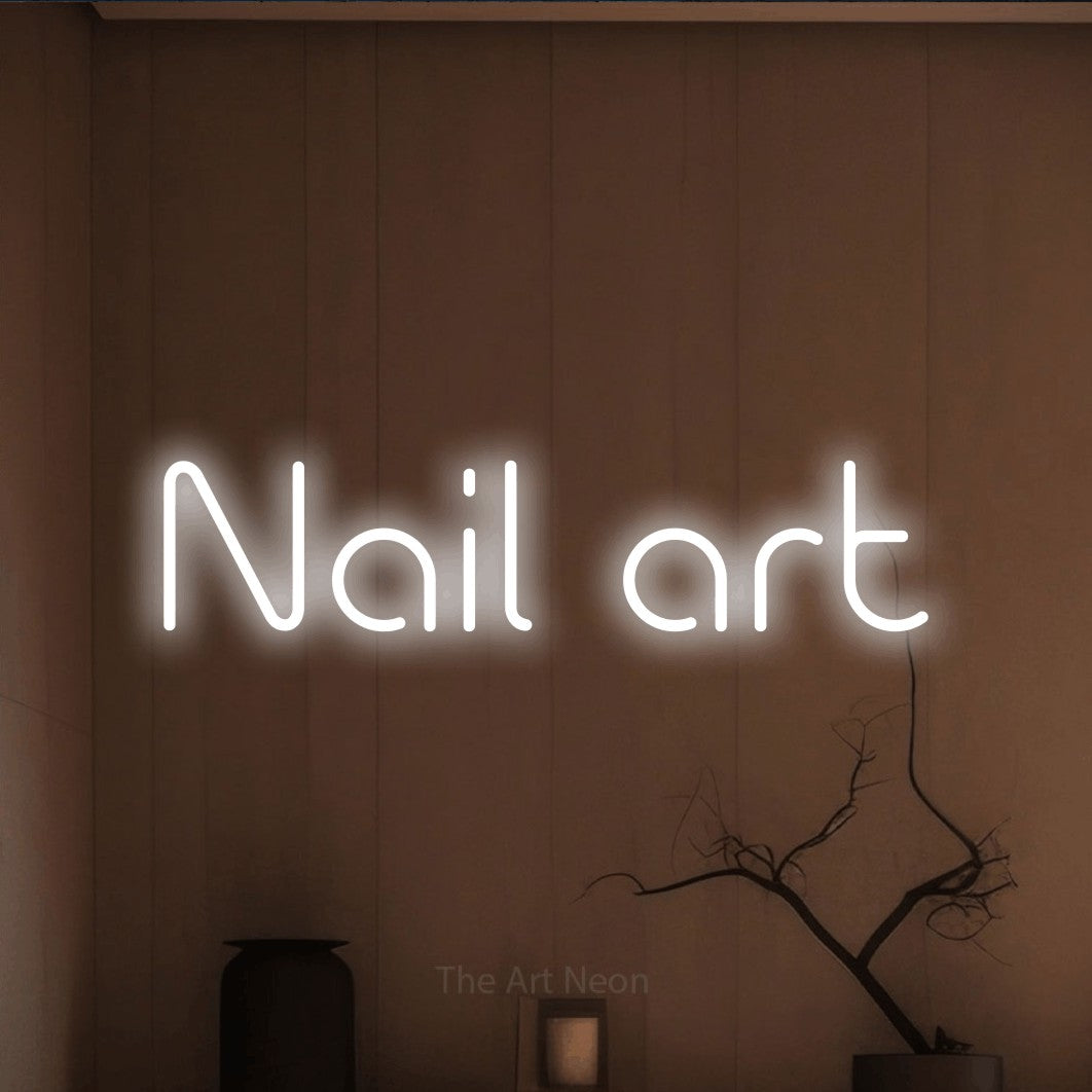 LED neon sign reading “Nail art”, arranged in a single line.