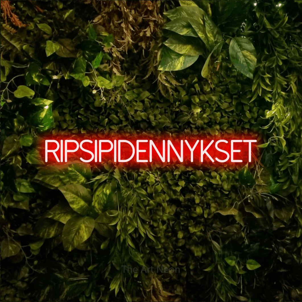 LED neon sign reading “RIPSIPIDENNYKSET”, arranged in a single line.