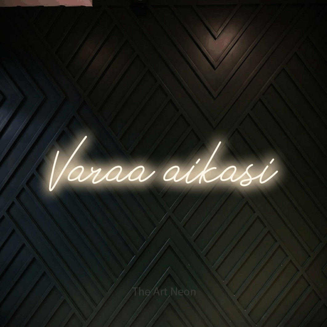 LED neon sign reading “Varaa aikasi”, arranged in a single line.