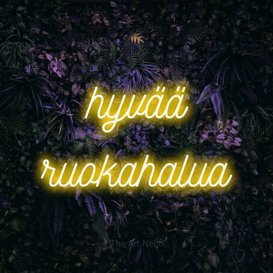 LED neon sign reading “hyvää ruokahalua”, arranged in 2 lines.