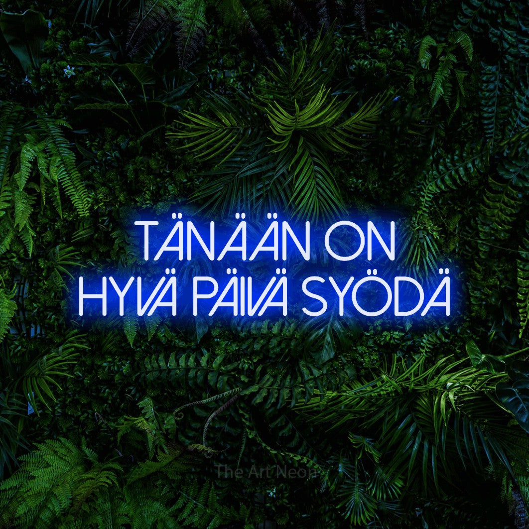LED neon sign reading “tänään on hyvä päivä syödä”, arranged in 2 lines.