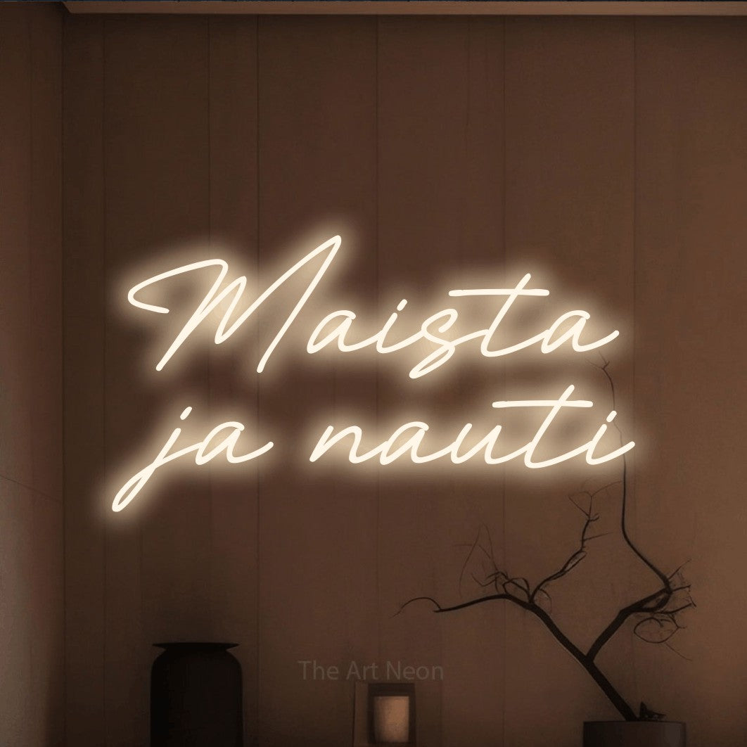 LED neon sign reading “Maista ja nauti”, arranged in 2 lines.