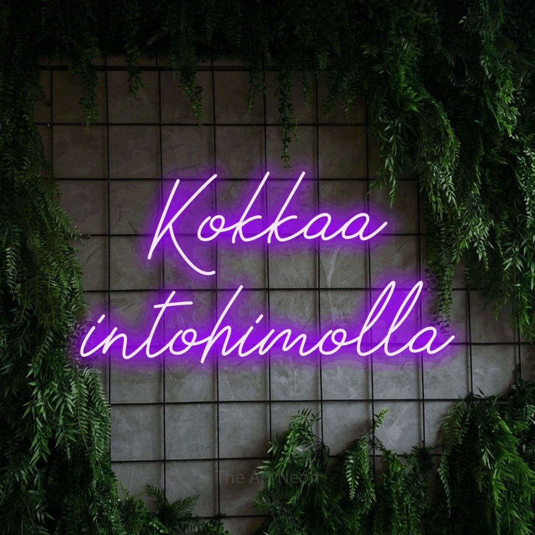 LED neon sign reading “Kokkaa intohimolla”, arranged in 2 lines.