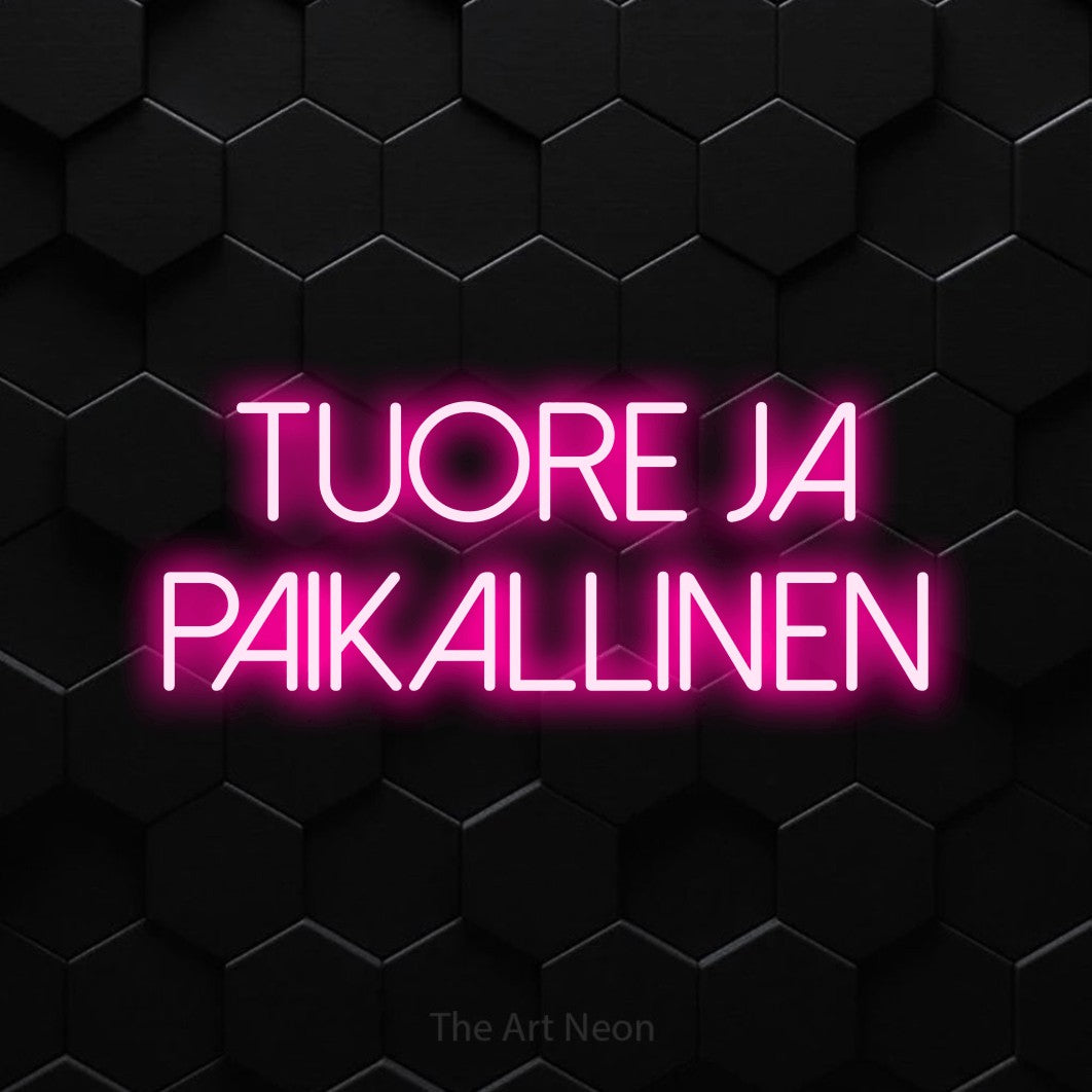 LED neon sign reading “tuore ja paikallinen”, arranged in 2 lines.