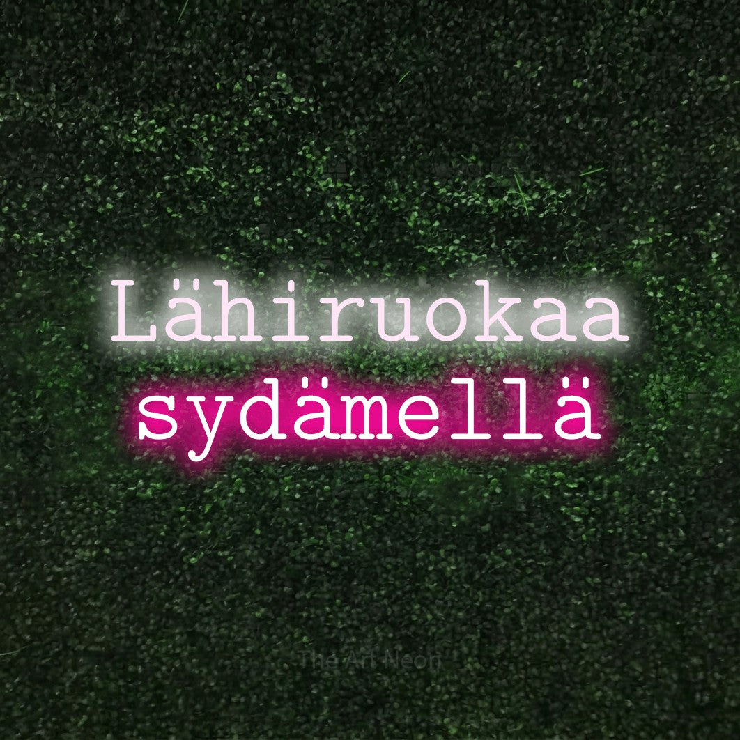 LED neon sign reading “Lähiruokaa sydämellä”, arranged in 2 lines.