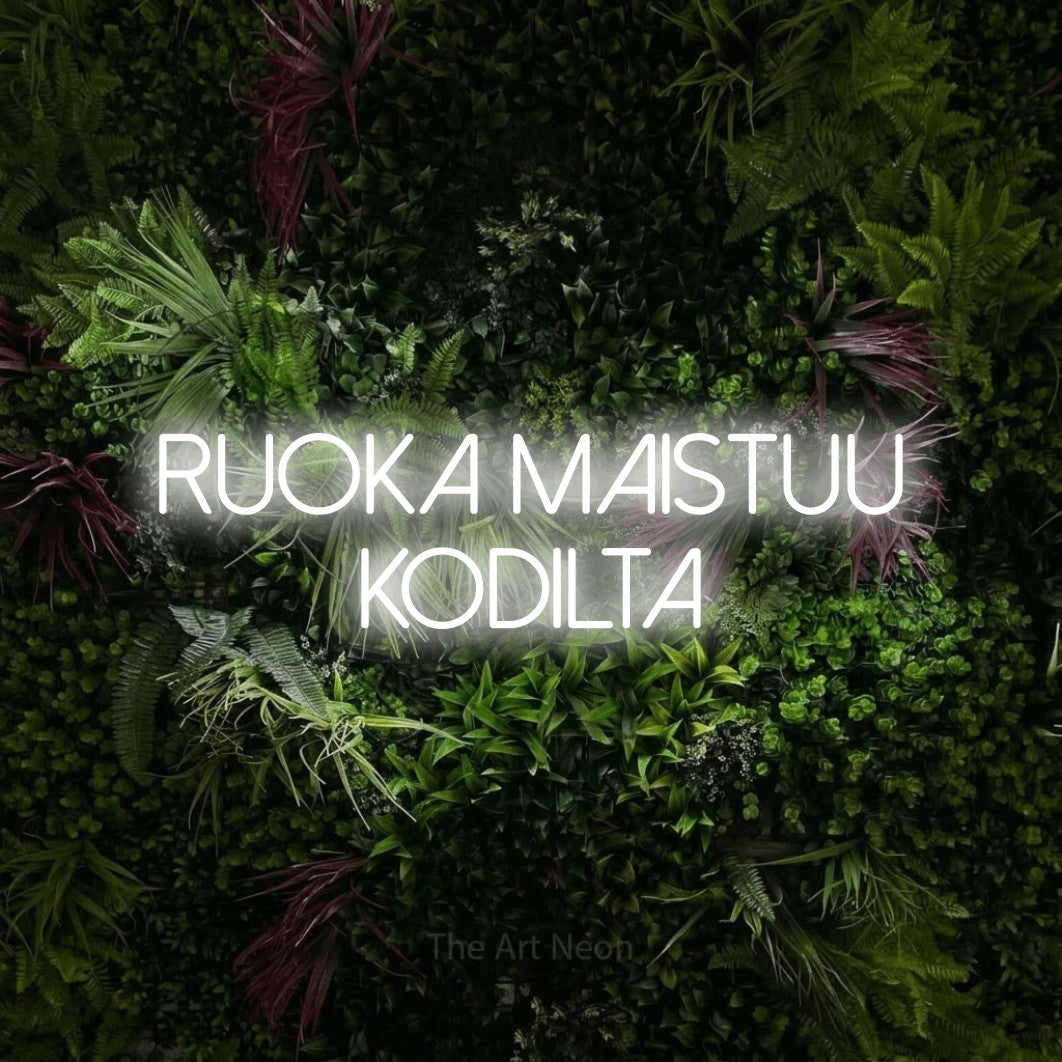 LED neon sign reading “Ruoka maistuu kodilta”, arranged in 2 lines.