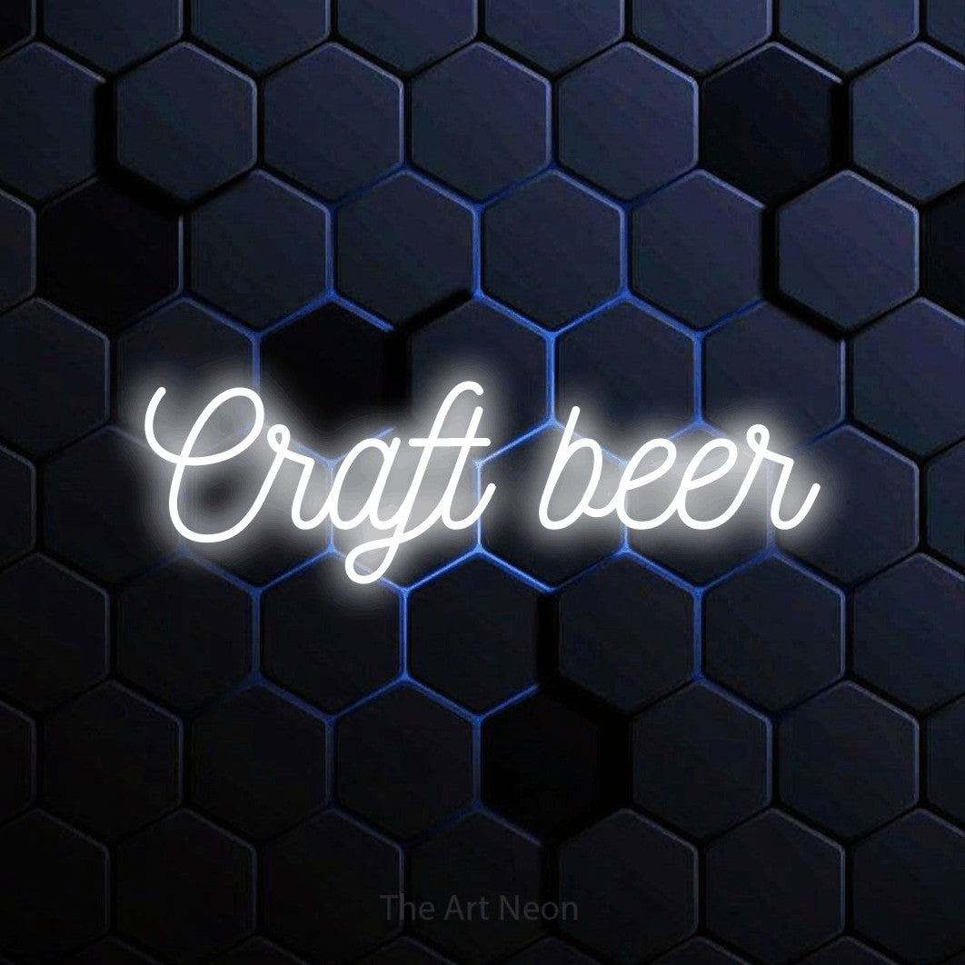 LED neon sign reading “Craft beer”, arranged in a single line.