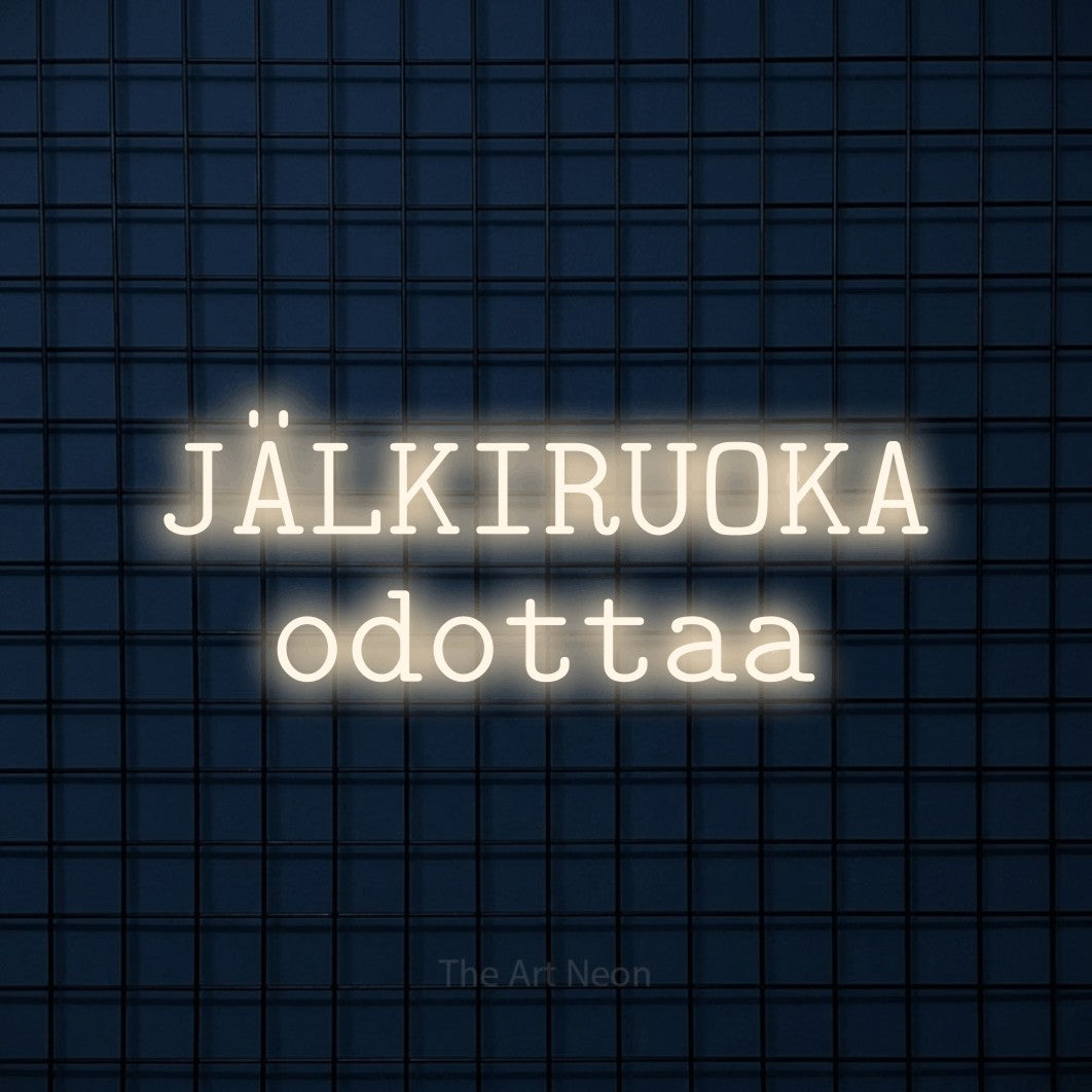 LED neon sign reading “JÄLKIRUOKA odottaa”, arranged in 2 lines.