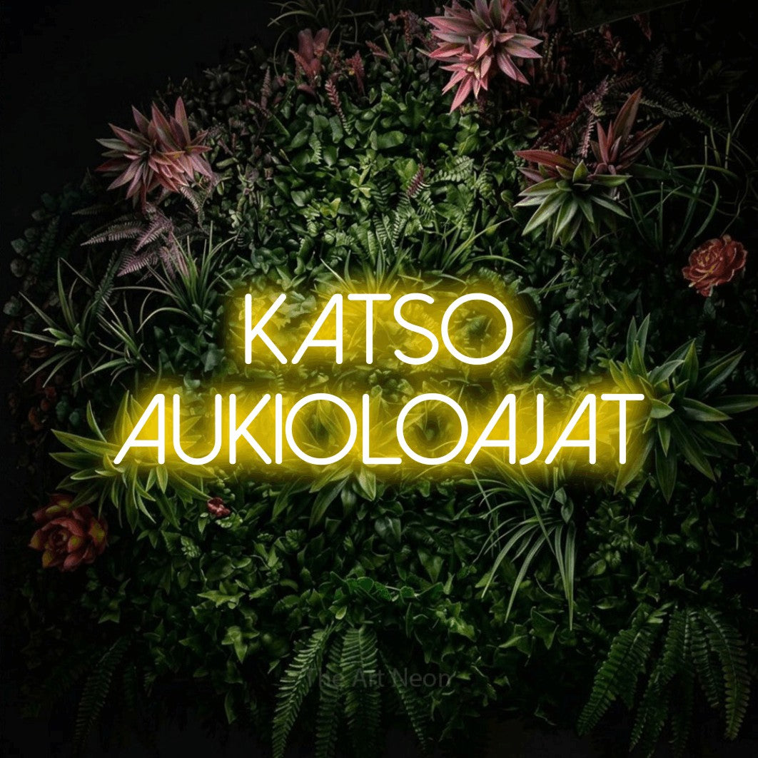 LED neon sign reading “Katso aukioloajat”, arranged in 2 lines.