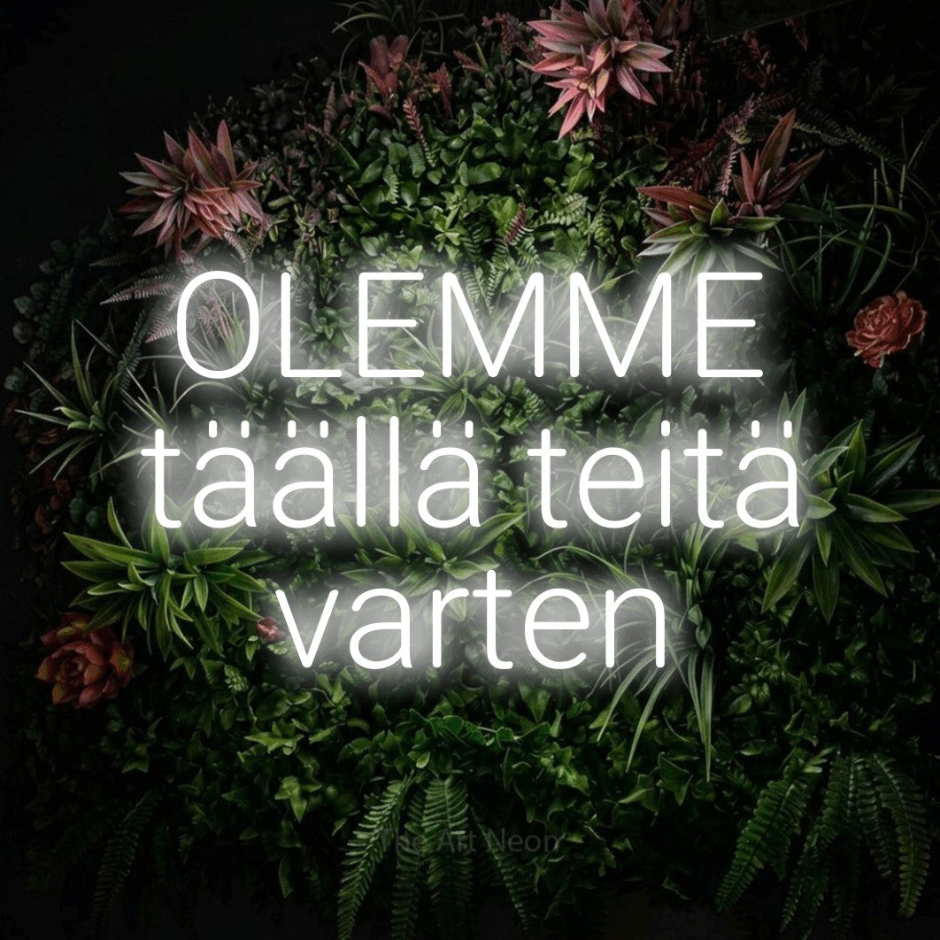LED neon sign reading “OLEMME täällä teitä varten”, arranged in 3 lines.