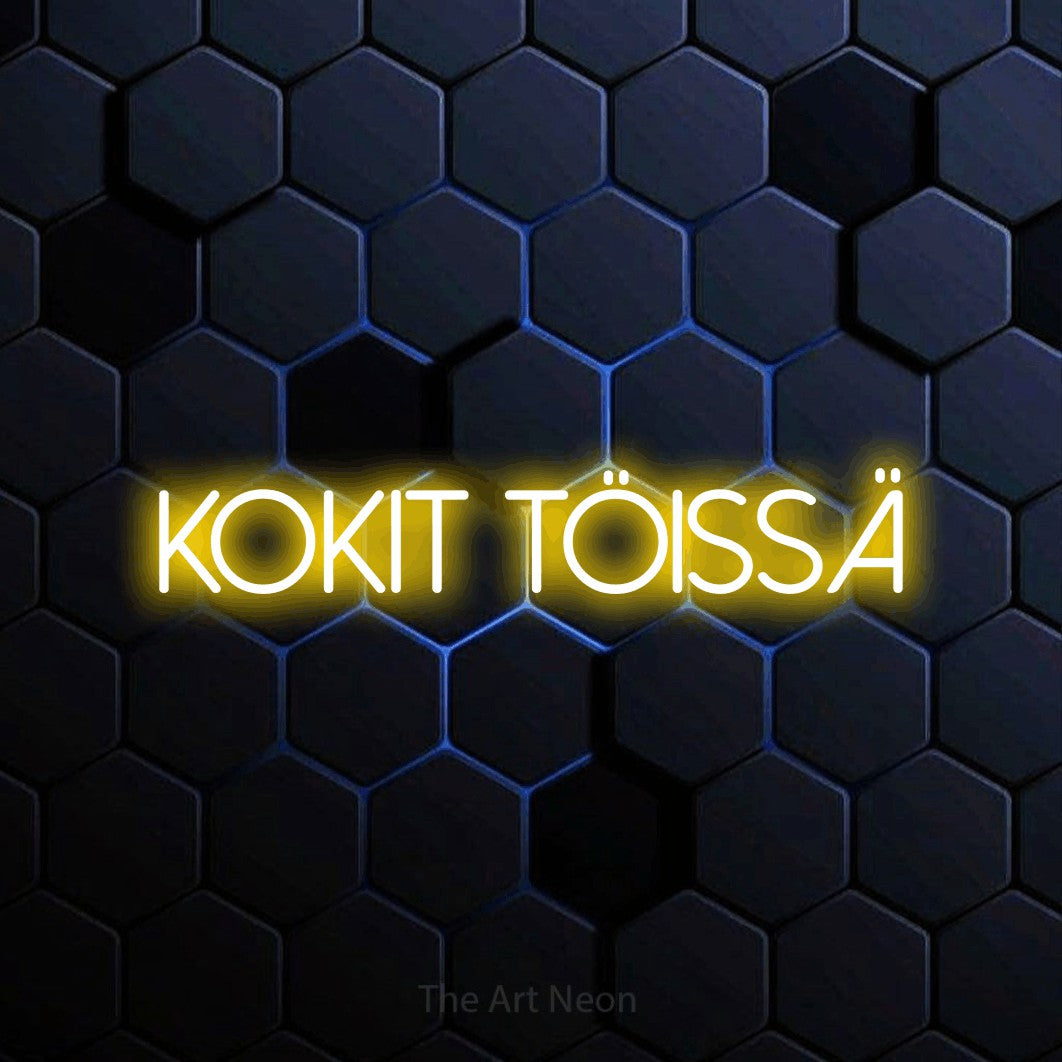 LED neon sign reading “Kokit töissä”, arranged in a single line.