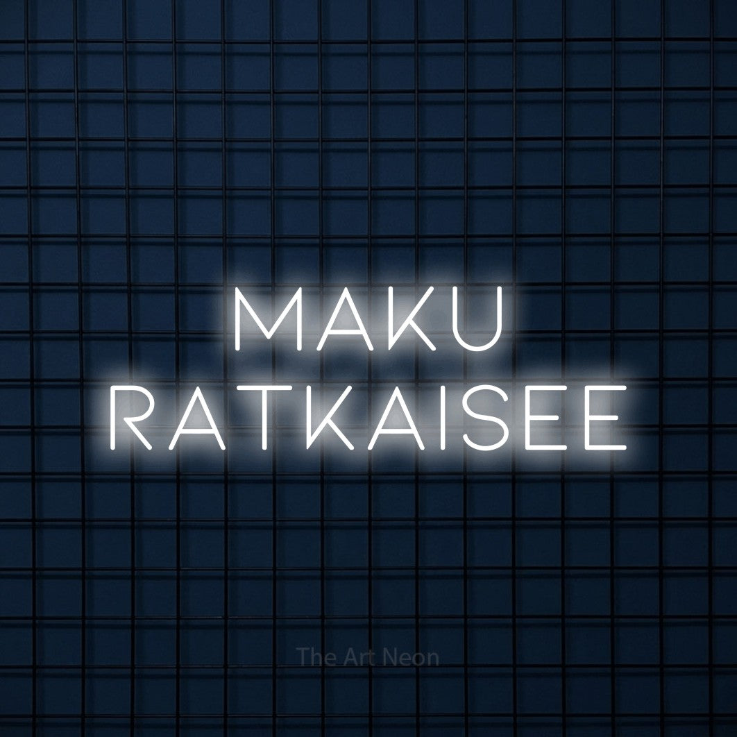 LED neon sign reading “maku ratkaisee”, arranged in 2 lines.