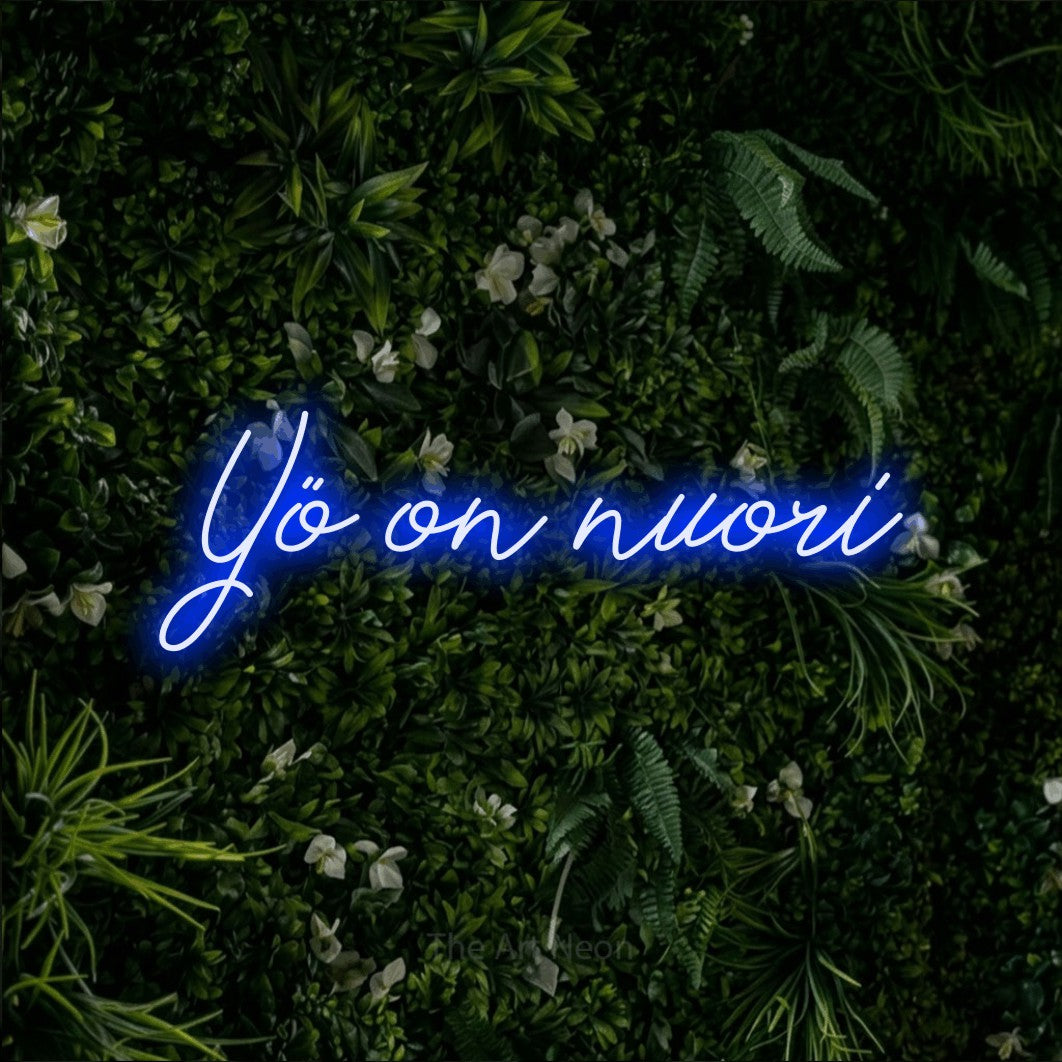 LED neon sign reading “Yö on nuori”, arranged in a single line.