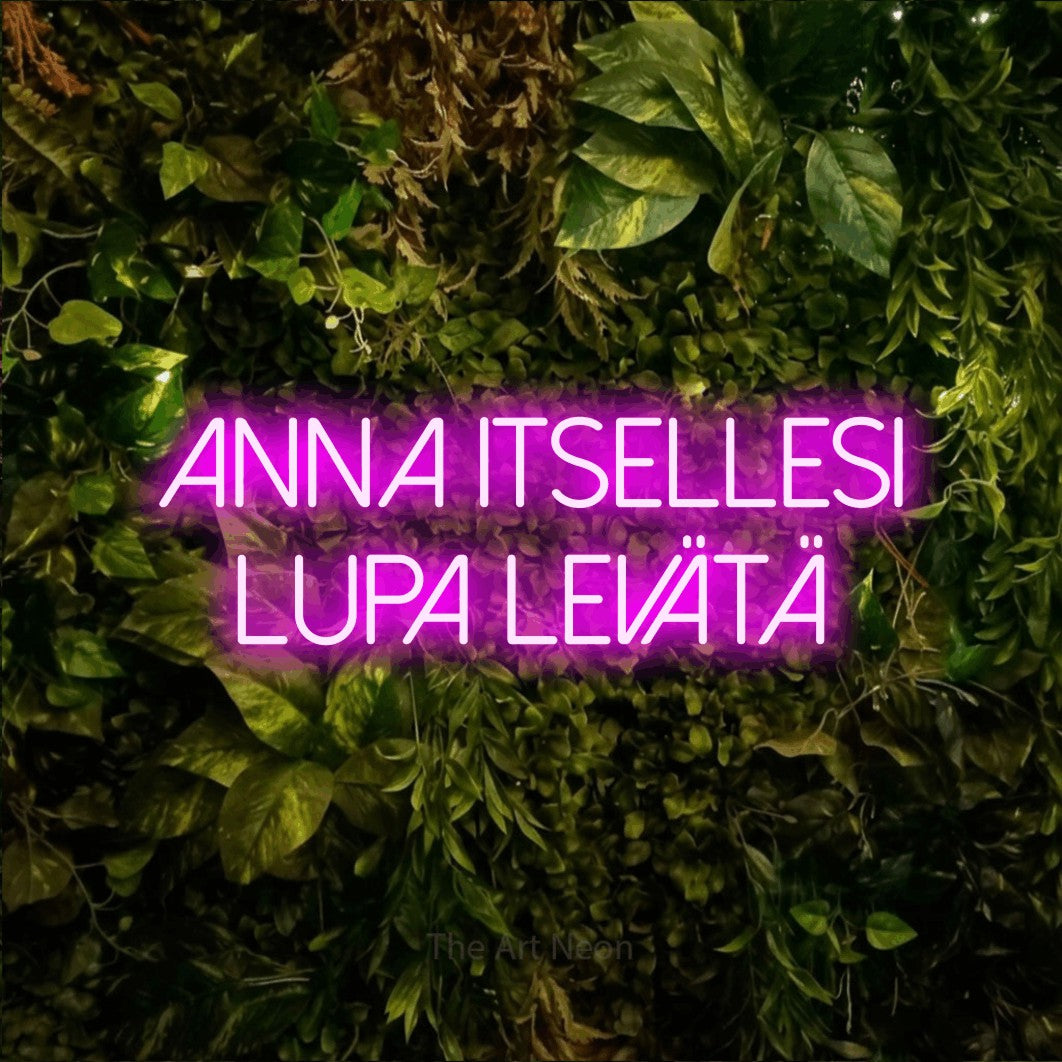 LED neon sign reading “Anna itsellesi lupa levätä”, arranged in 2 lines.