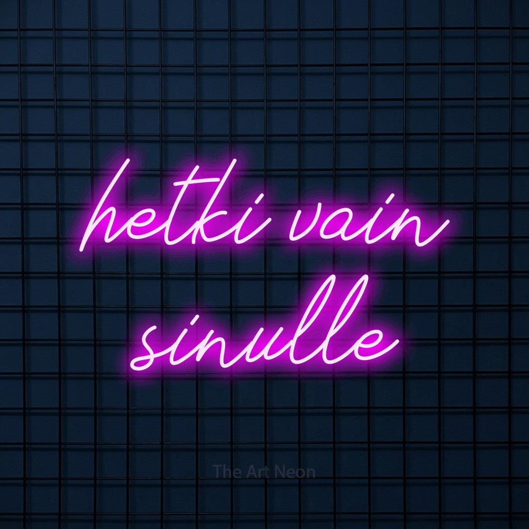 LED neon sign reading “hetki vain sinulle”, arranged in 2 lines.