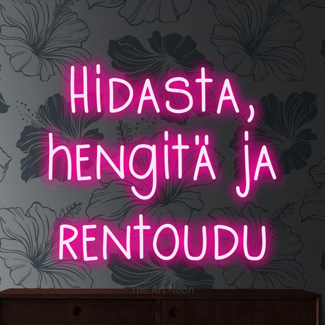 LED neon sign reading “Hidasta, hengitä ja rentoudu”, arranged in 3 lines.
