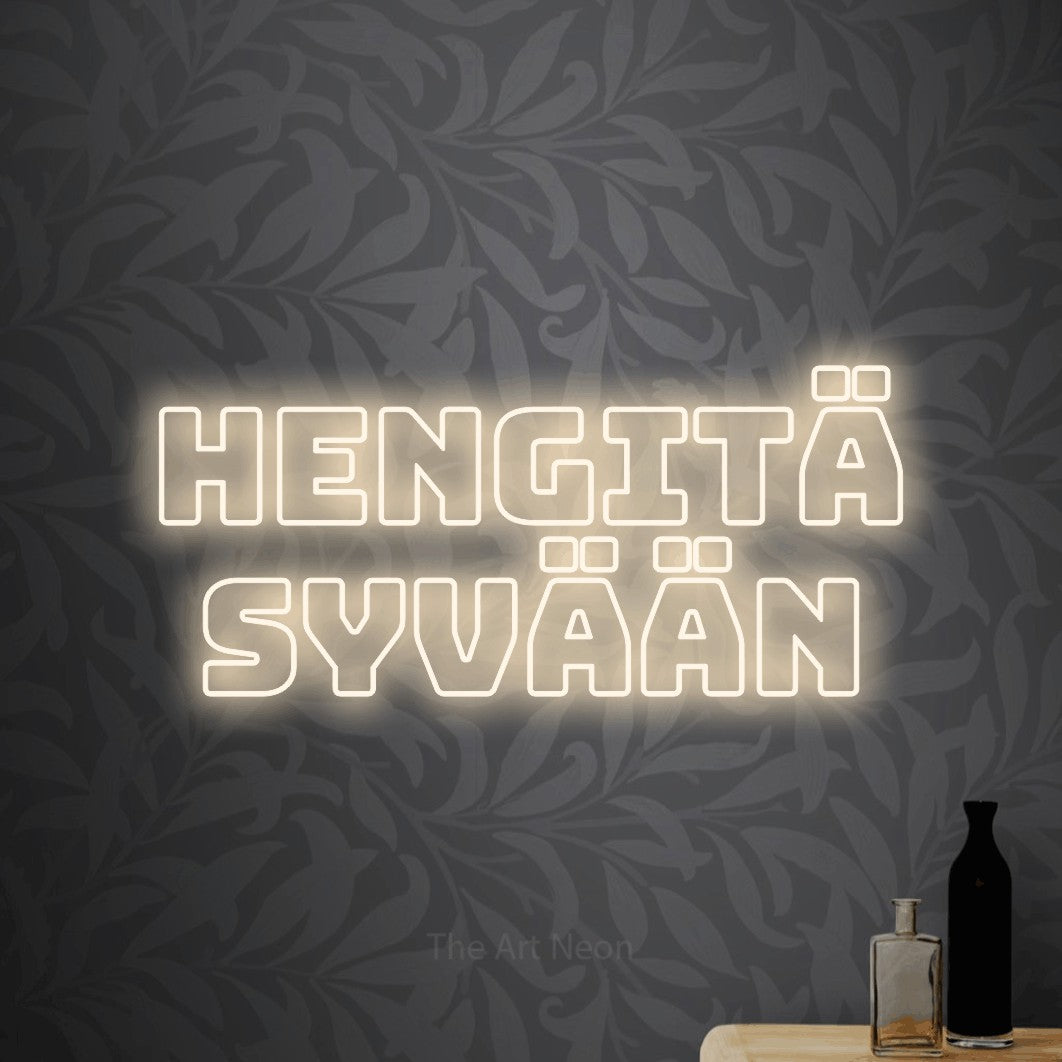 LED neon sign reading “hengitä syvään”, arranged in 2 lines.