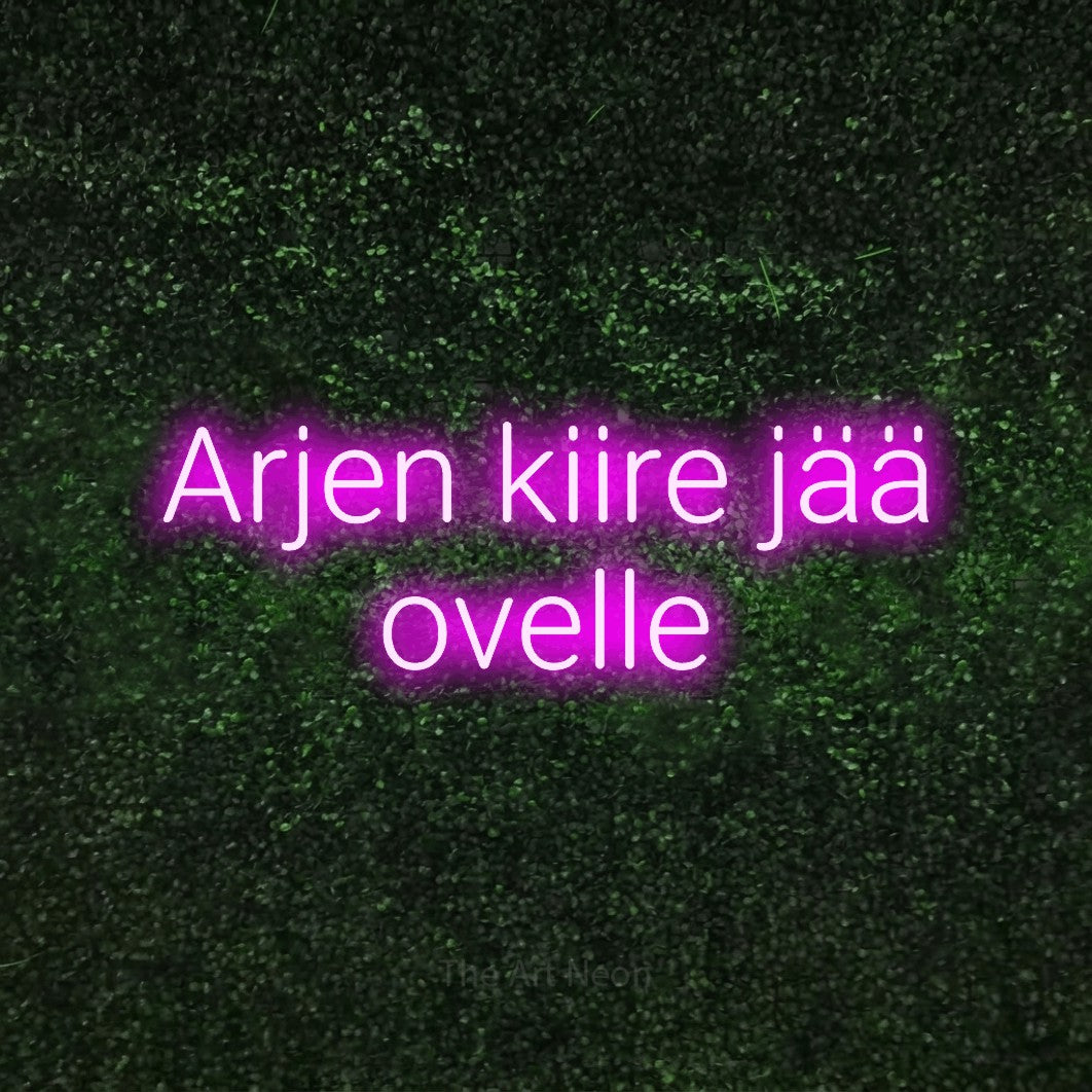LED neon sign reading “Arjen kiire jää ovelle”, arranged in 2 lines.