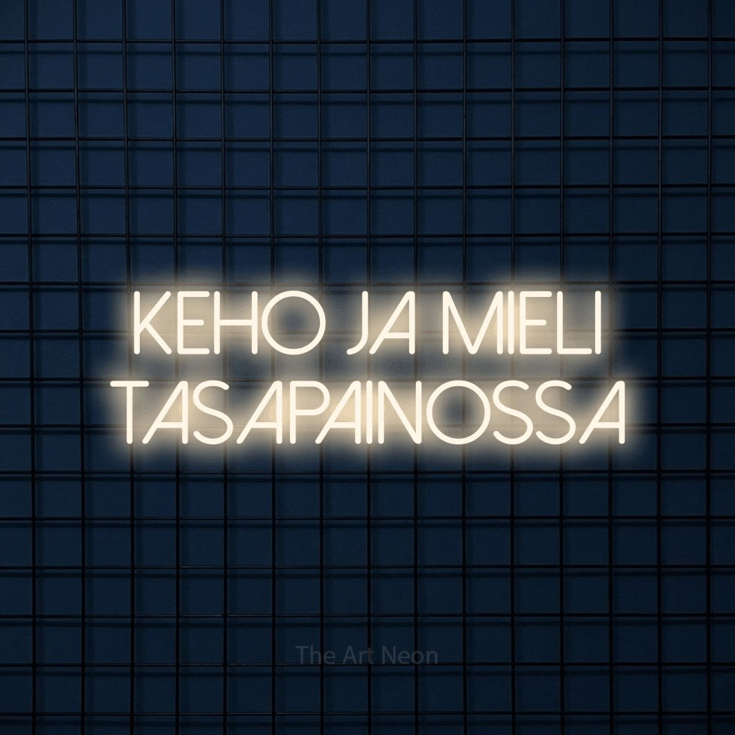 LED neon sign reading “keho ja mieli tasapainossa”, arranged in 2 lines.