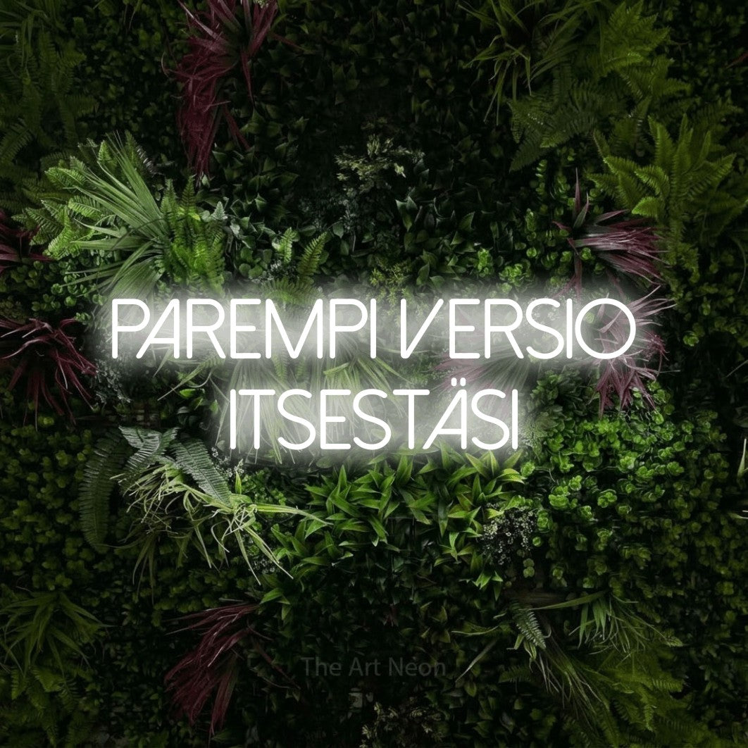 LED neon sign reading “PAREMPI VERSIO ITSESTÄSI”, arranged in 2 lines.