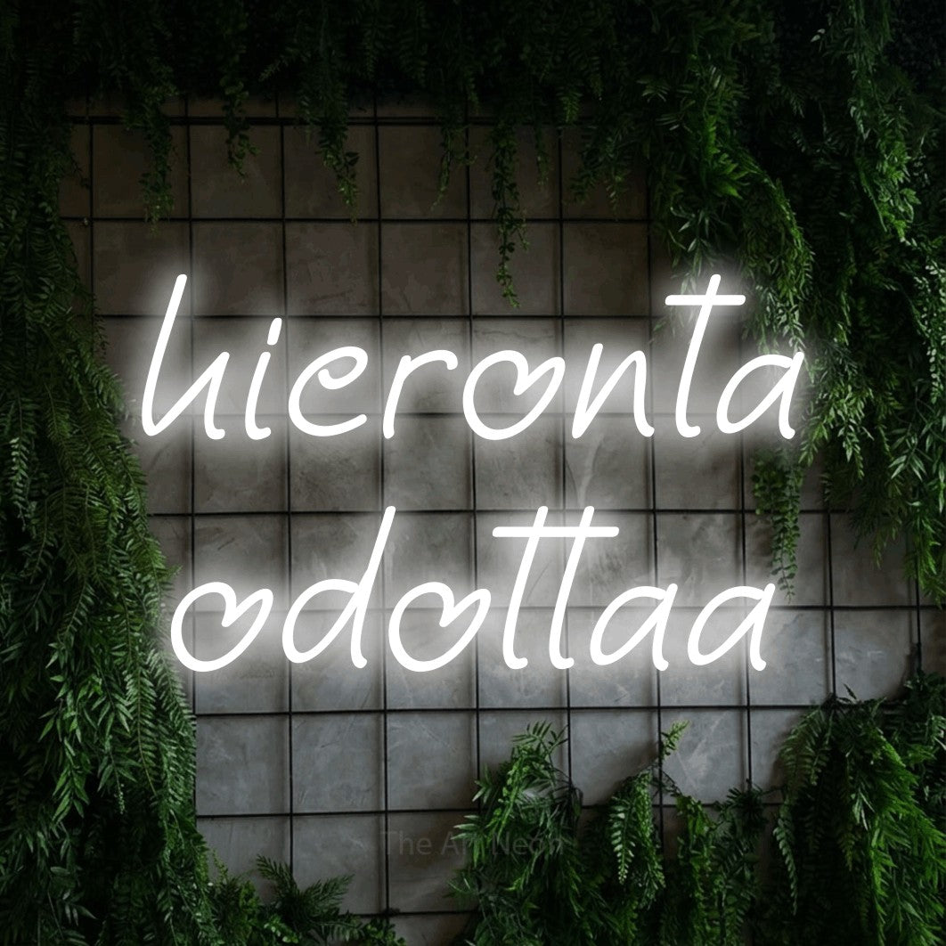 LED neon sign reading “hieronta odottaa”, arranged in 2 lines.