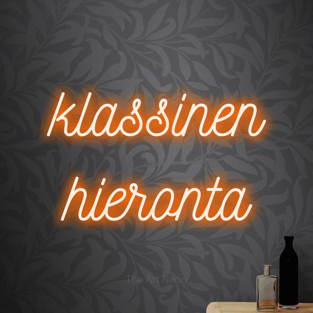 LED neon sign reading “klassinen hieronta”, arranged in 2 lines.