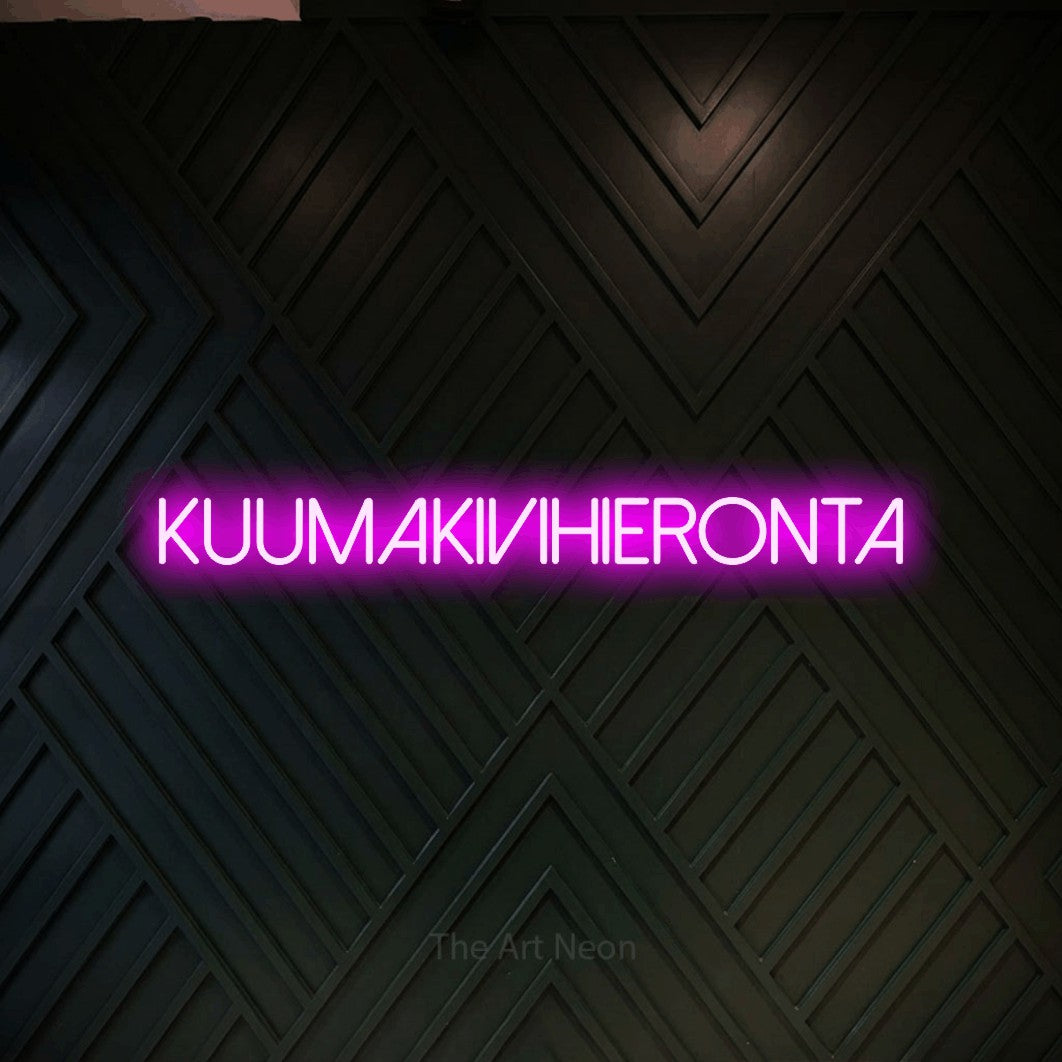 LED neon sign reading “KUUMAKIVIHIERONTA”, arranged in a single line.