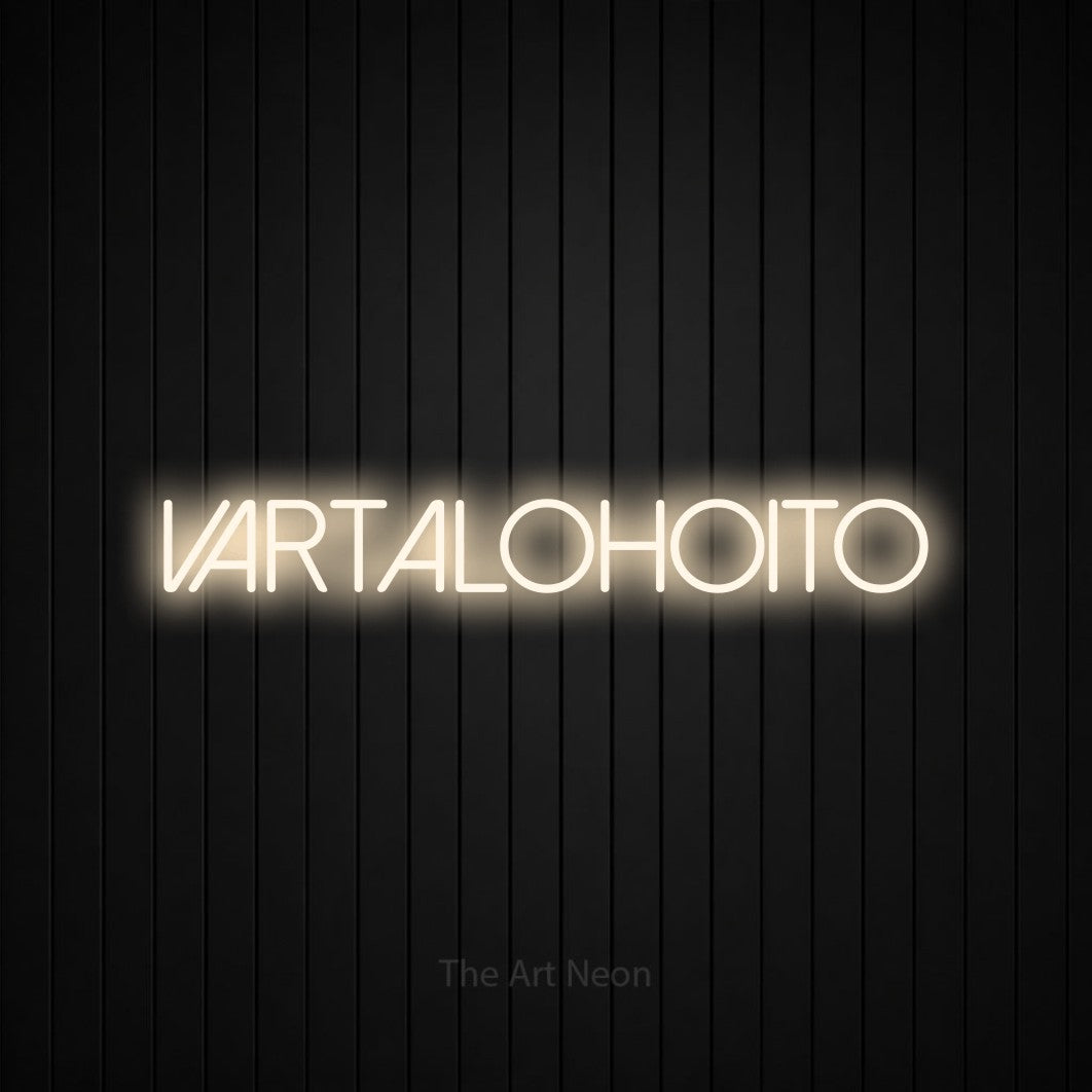 LED neon sign reading “VARTALOHOITO”, arranged in a single line.