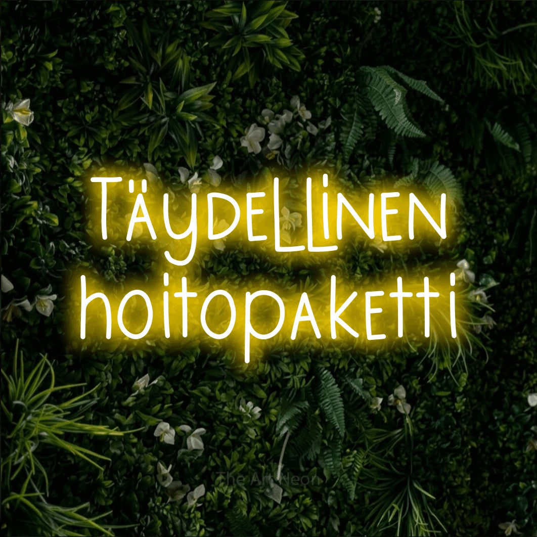 LED neon sign reading “Täydellinen hoitopaketti”, arranged in 2 lines.