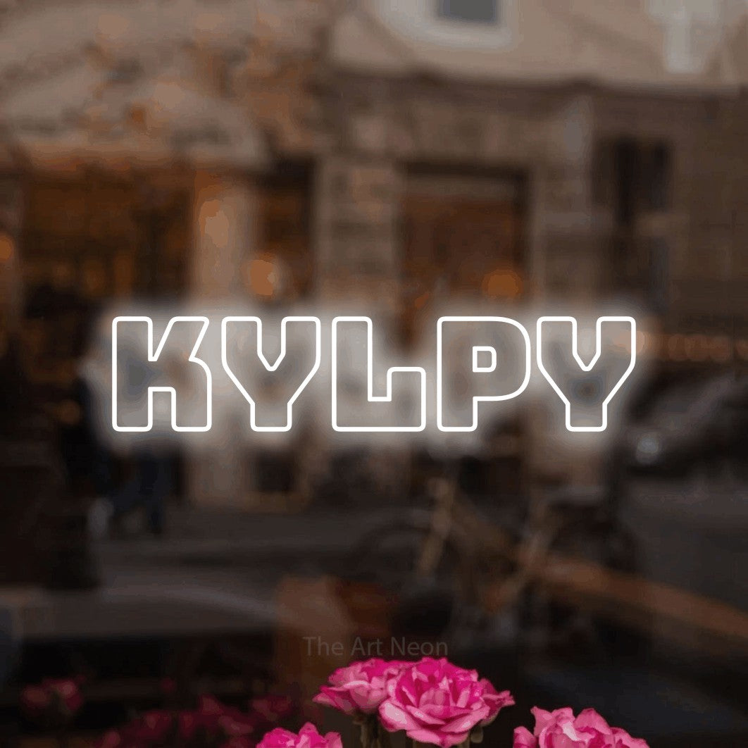 LED neon sign reading “Kylpy”, arranged in a single line.