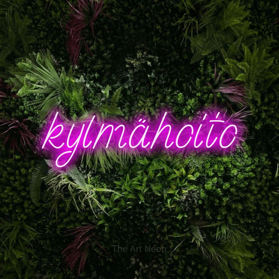 LED neon sign reading “kylmähoito”, arranged in a single line.
