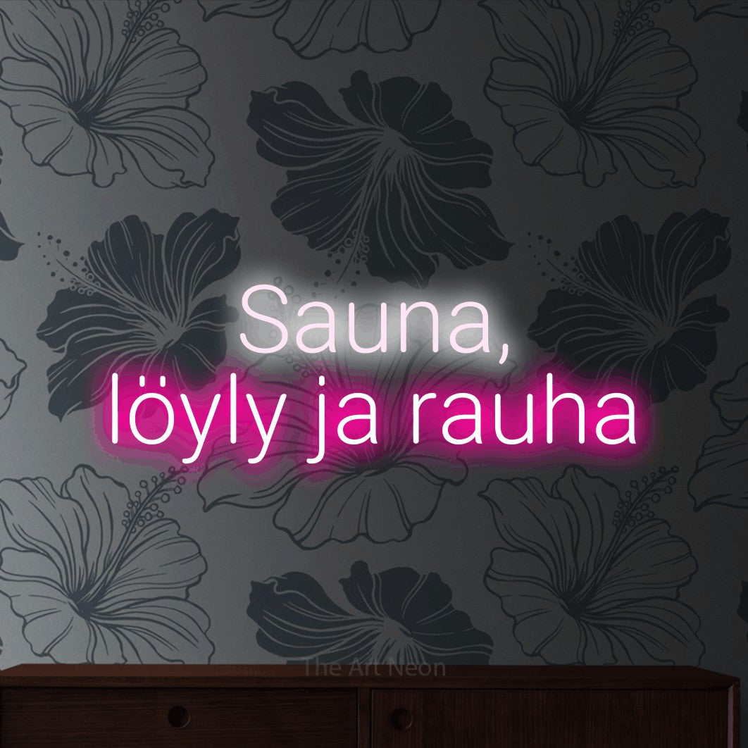 LED neon sign reading “Sauna, löyly ja rauha”, arranged in 2 lines.
