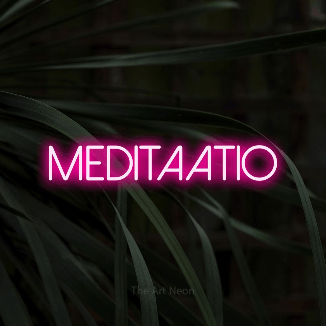 LED neon sign reading “Meditaatio”, arranged in a single line.