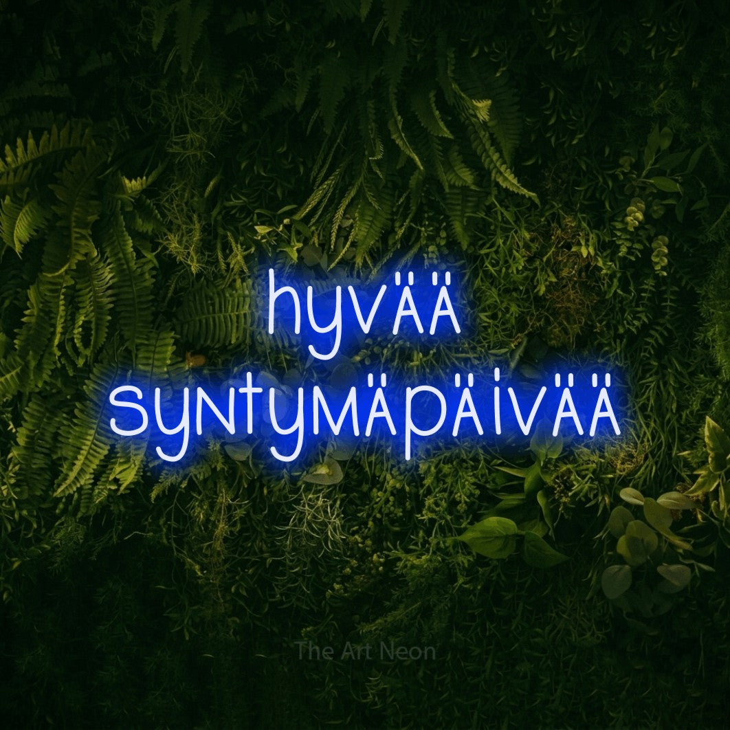 LED neon sign reading “hyvää syntymäpäivää”, arranged in 2 lines.