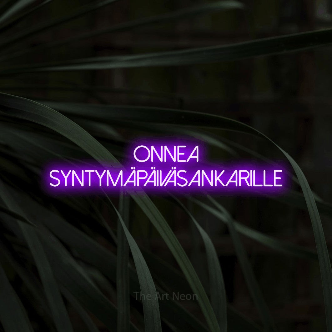 LED neon sign reading “onnea SYNTYMÄPÄIVÄSANKARILLE”, arranged in 2 lines.