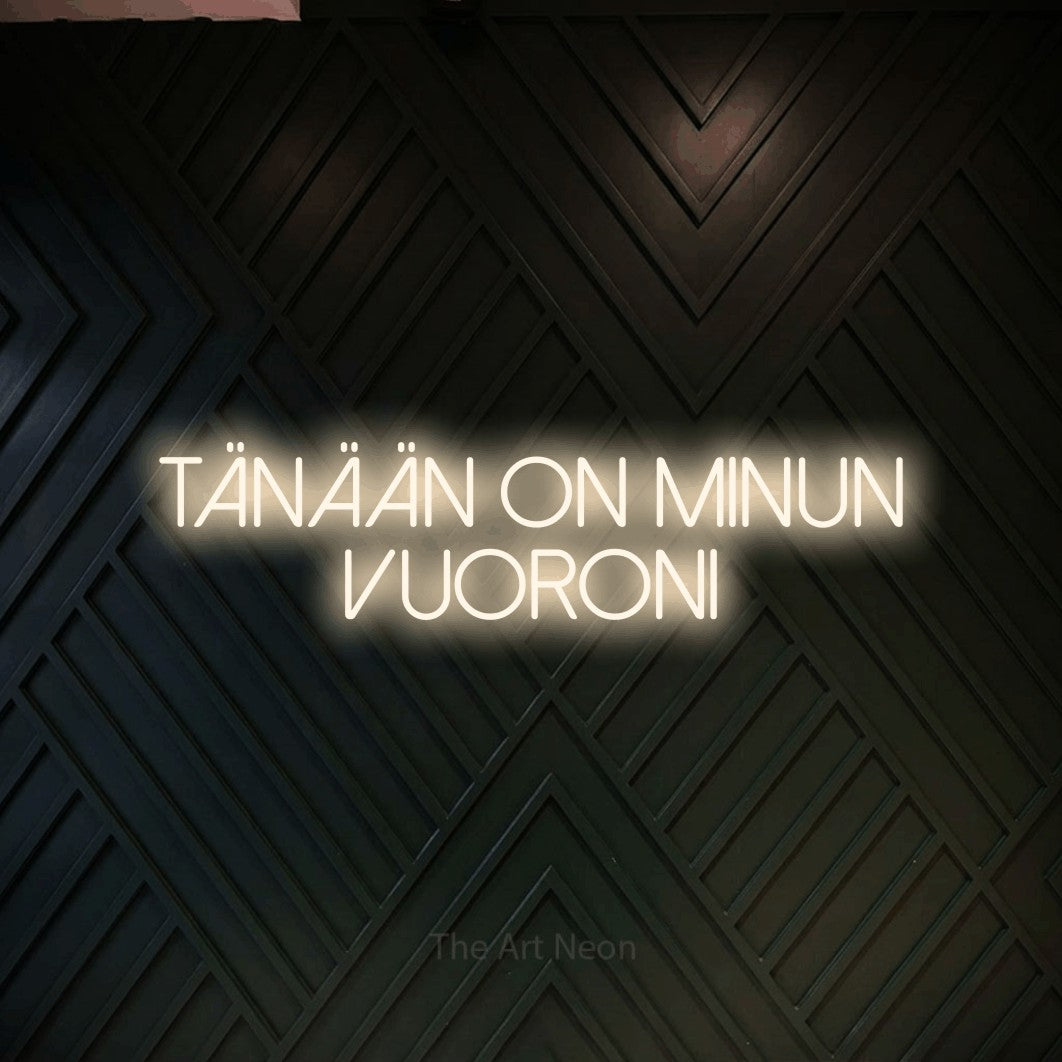 LED neon sign reading “tänään on minun vuoroni”, arranged in 2 lines.