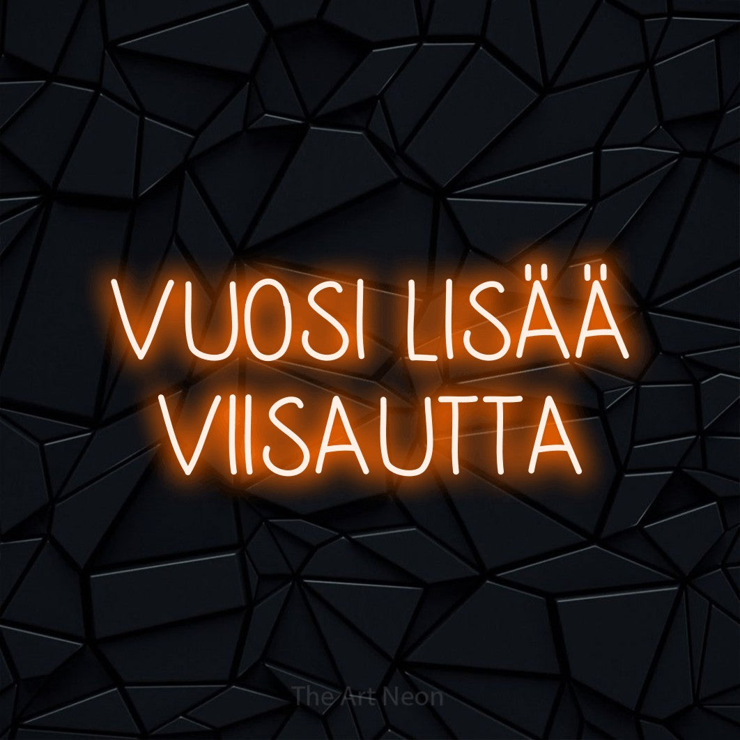 LED neon sign reading “VUOSI LISÄÄ VIISAUTTA”, arranged in 2 lines.
