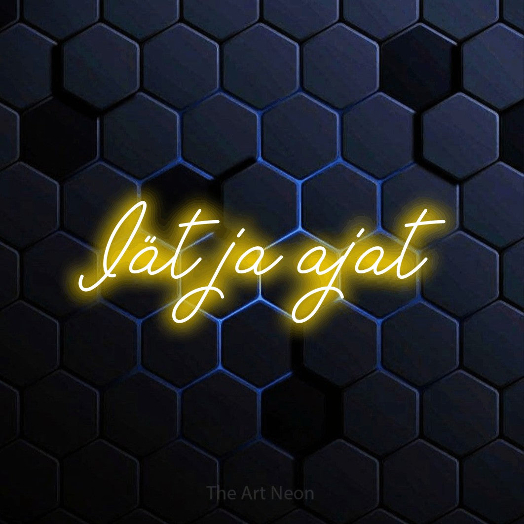 LED neon sign reading “Iät ja ajat”, arranged in a single line.