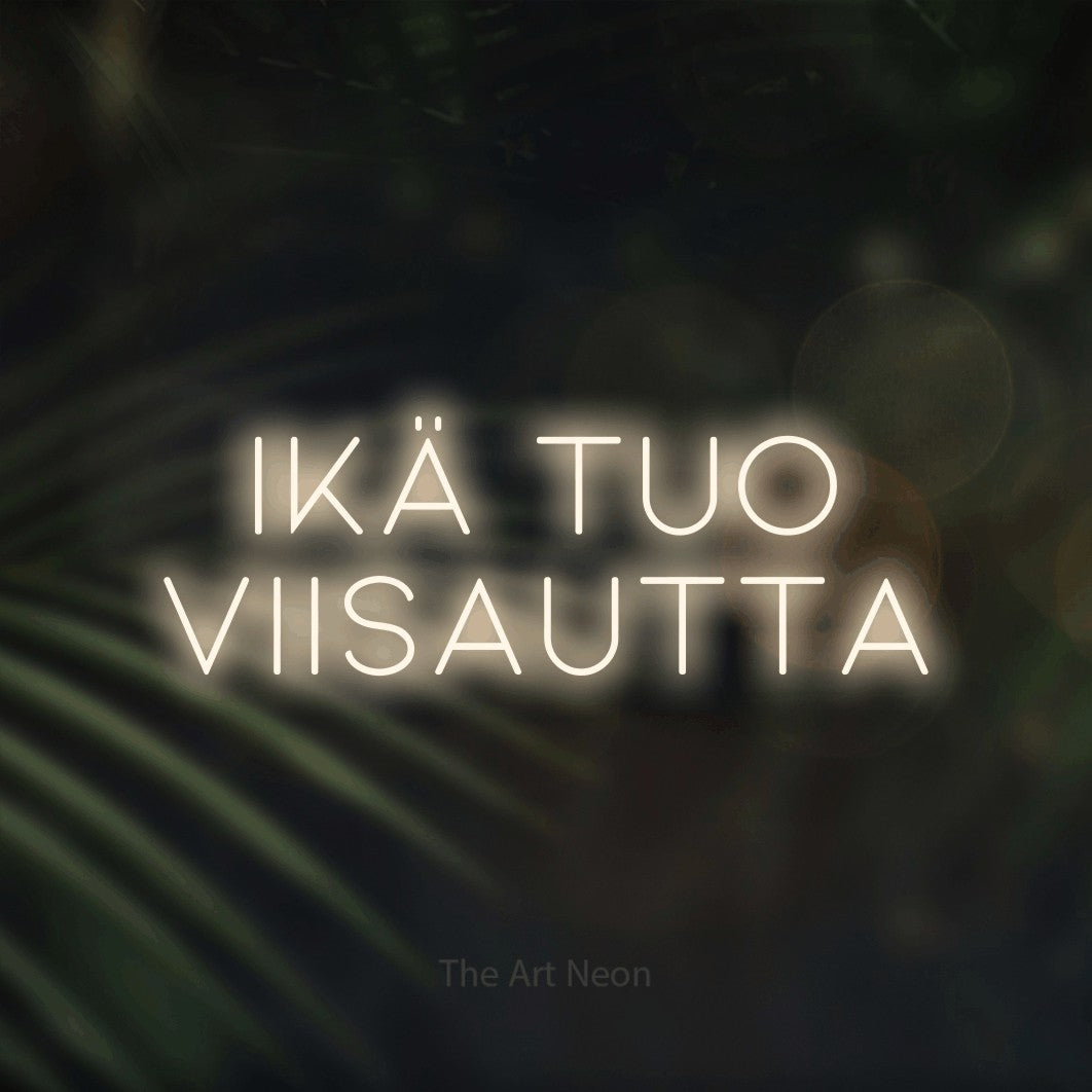 LED neon sign reading “Ikä tuo viisautta”, arranged in 2 lines.