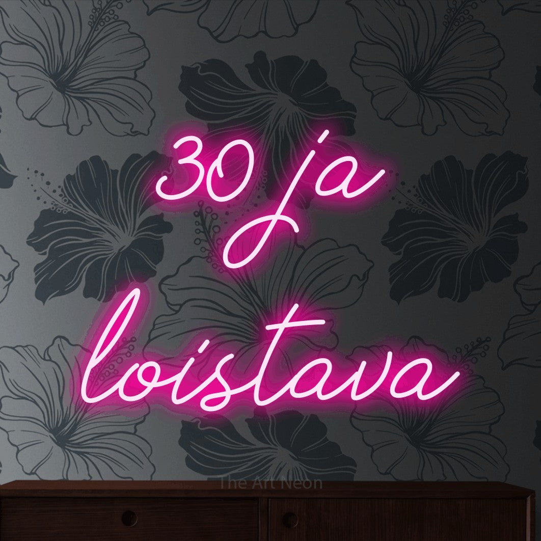 LED neon sign reading “30 ja loistava”, arranged in 2 lines.