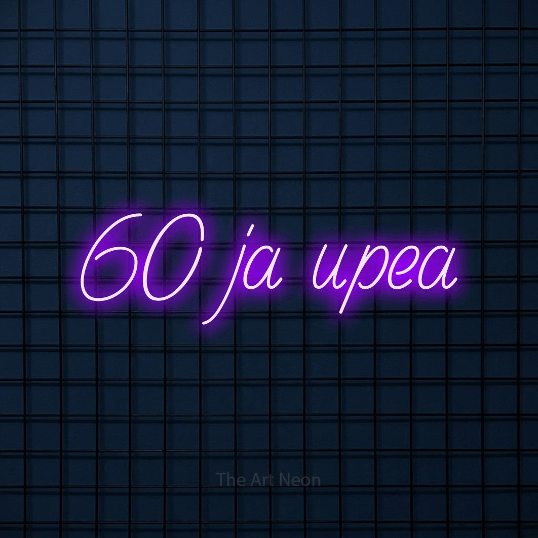 LED neon sign reading “60 ja upea”, arranged in a single line.