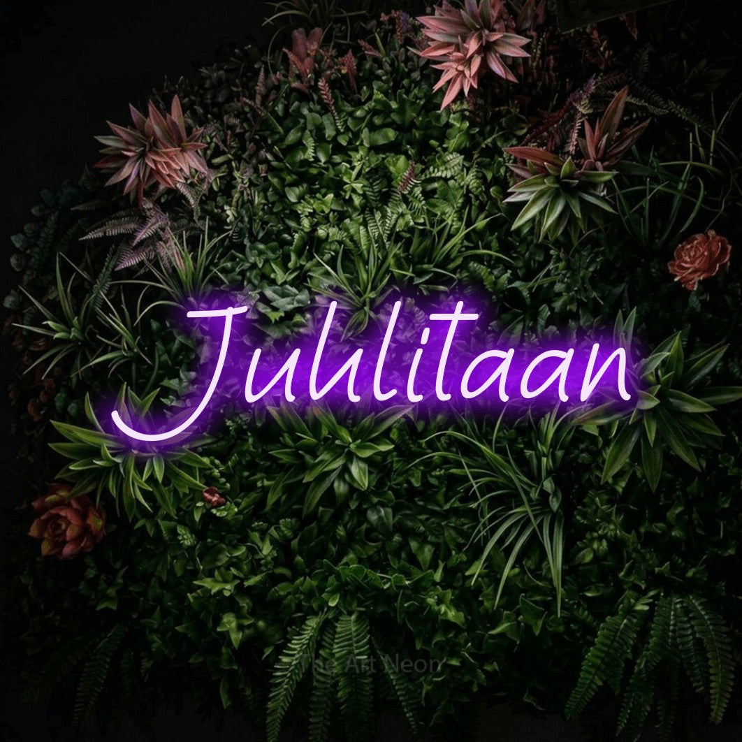 LED neon sign reading “Juhlitaan”, arranged in a single line.