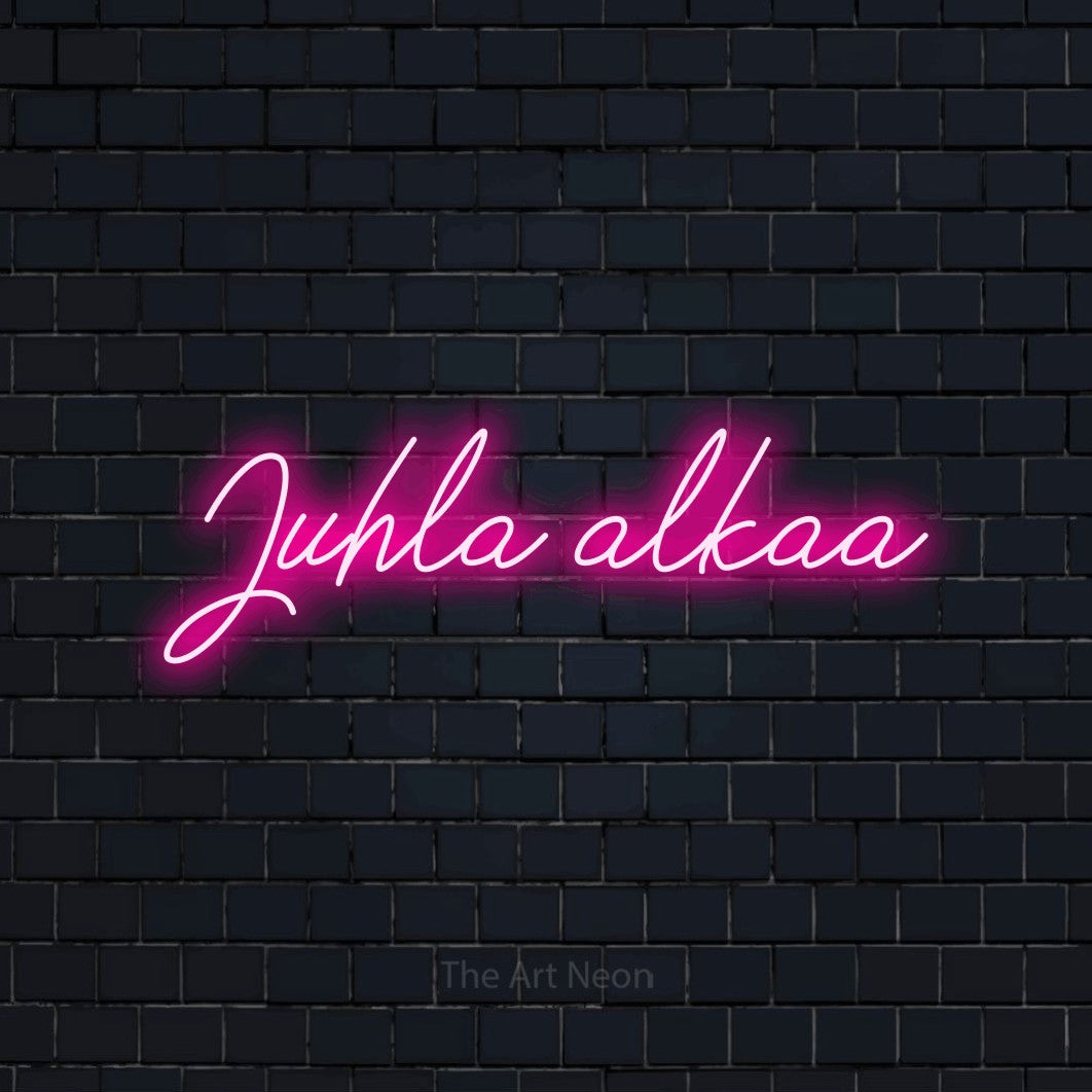 LED neon sign reading “Juhla alkaa”, arranged in a single line.