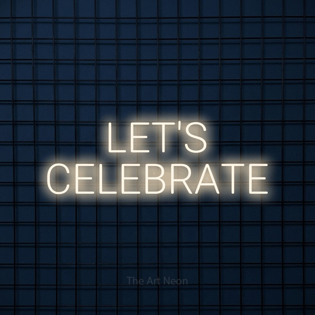 LED neon sign reading “LET'S CELEBRATE”, arranged in 2 lines.