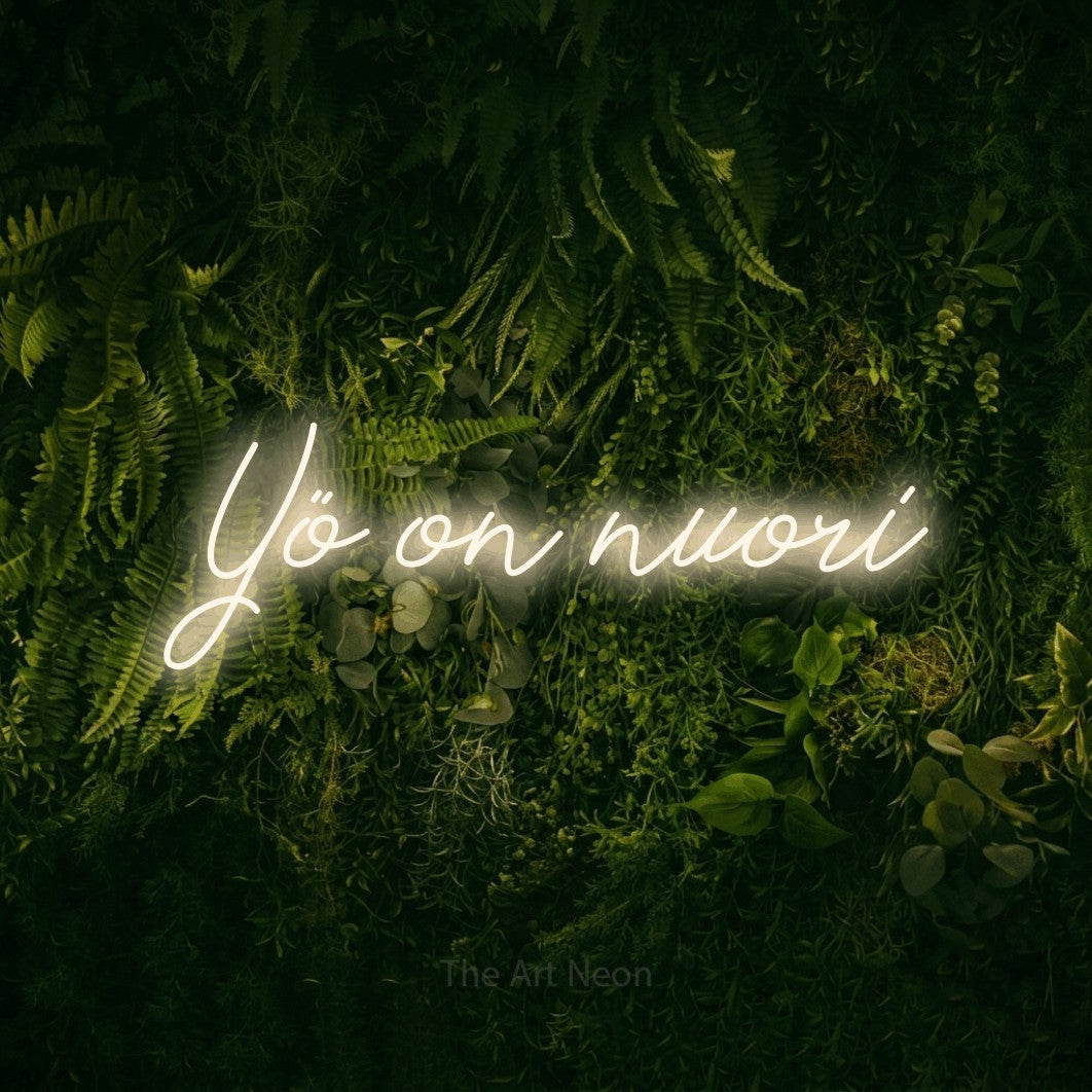 LED neon sign reading “Yö on nuori”, arranged in a single line.
